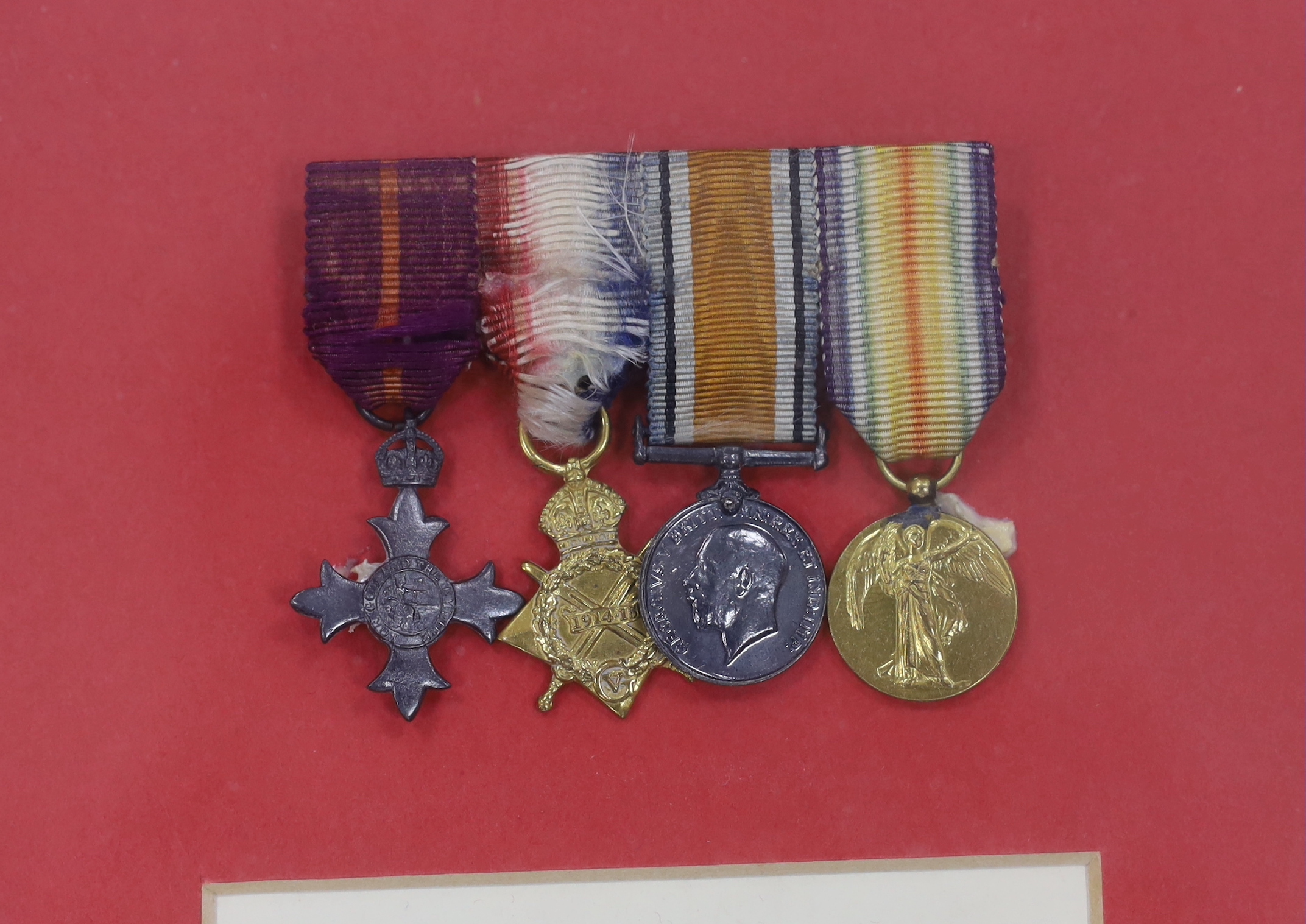 Major Percy Eardley Wilmot, a framed WWI medal group comprising of the War Medal, Victory Medal, 1914/15 Star and military OBE, together with the miniature set